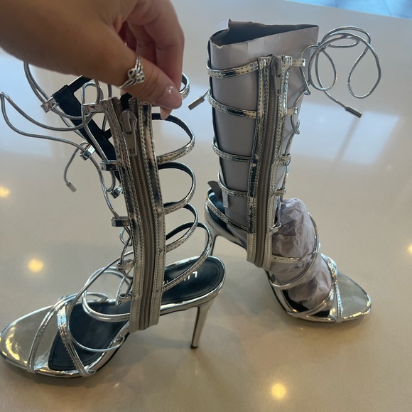 Brand new in the box silver tie up heels. Great price - Picture 1 of 1